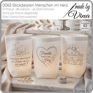 Könnte beinhalten: Drei weiße Windlichter mit verschiedenen Designs. Eines zeigt Hände, ein anderes ein Herz mit dem Wort "Familie" und das dritte ein Paar auf einer Bank. Der Text "made by Vina" ist sichtbar.