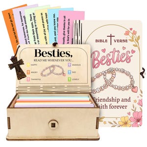 May include: A wooden box set with Bible verses and the word "Besties." The box has a hinged lid with a cross charm and a lock. The set includes colourful cards and a decorative cover with the words "Friendship and faith forever."