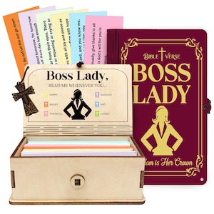 May include: A wooden box set with colourful cards and a burgundy Bible Verse book. The box reads "Boss Lady, Read Me Whenever You..." with prompts for different moods. A cross-shaped charm hangs from the box.