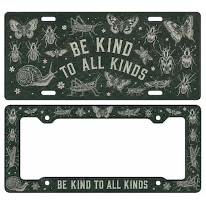May include: A license plate and frame set with a dark green background and white illustrations of insects, butterflies, and a snail. The text "BE KIND TO ALL KINDS" is centered on both pieces.