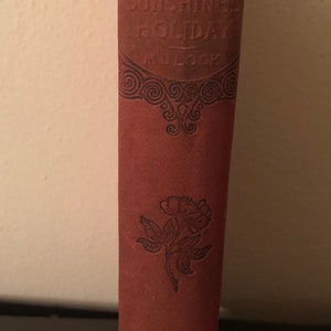 Little Sunshine&#39;s Holiday by Miss Mulock 1900s - vintage red ornate book for young girls.