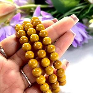 8 MM gele ronde stretcharmband met gele jaspissteen