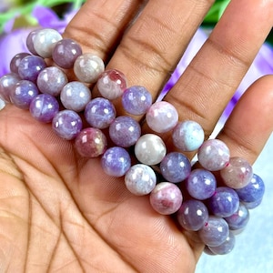 May include: A set of three ceramic mugs with a speckled, matte finish. The mugs are in shades of cream, light gray, and dark gray. Each mug has a simple, minimalist design, perfect for coffee or tea.