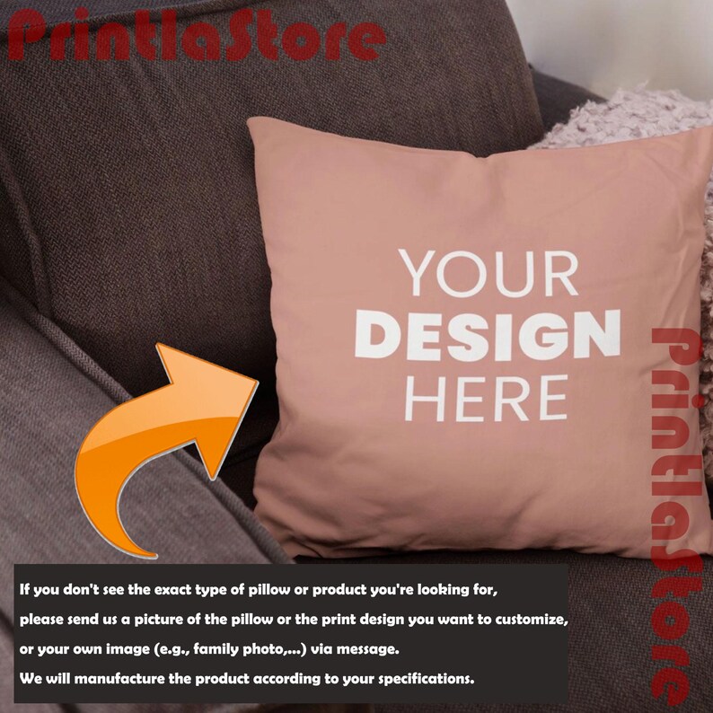 a brown couch with a pink pillow on it. The pillow has the text "YOUR DESIGN HERE" printed on it.