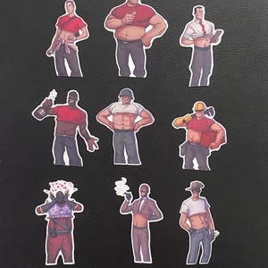May include: A collection of nine sticker cutouts featuring stylized illustrations of muscular figures in various poses and outfits. The figures are depicted in a variety of work-related attire, including construction, military, and business. The color palette includes red, white, and brown.