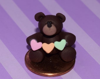 Miniature Teddy Bear with String of Hearts