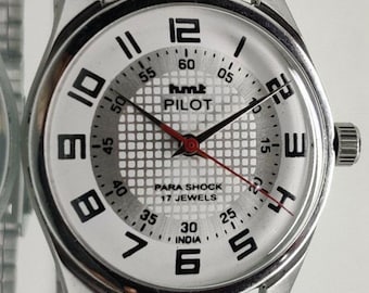 Reloj de pulsera mecánico de cuerda manual HMT Pilot vintage con esfera blanca, en buen estado.