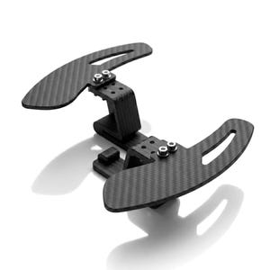 May include: A black carbon fiber paddle shifter assembly featuring two curved paddles connected by a central mounting bracket. The unit includes silver metal screws securing the paddles to the adjustable arms, showcasing a woven texture.