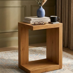 May include: A rustic wooden sign with the text "Welcome to our home" in a handwritten style. The sign is rectangular, with a distressed finish, and features a simple, inviting design. It's suitable for indoor or outdoor use.