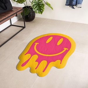 Drippy Smiley Face Rug – Add a splash of fun to your space with this funky, soft, and vibrant aesthetic carpet for trendy home decor!