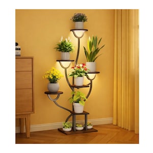 May include: A multi-tiered plant stand with built-in lights. The stand features dark brown shelves and a dark metal frame. Various potted plants with green foliage and colorful flowers are displayed on the shelves. The background is a yellow wall and a yellow curtain.