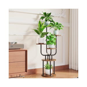 May include: A multi-tiered plant stand with a black metal frame and wooden shelves. The stand holds several potted green plants in white pots, creating a vertical garden display. The design is modern and suitable for indoor use.
