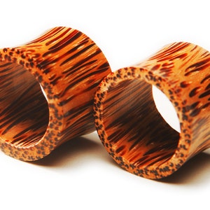 Ear Tunnels | Palm Wood Eyelets | Wood Tunnels | Plugs and Tunnels | Coconut Wood Tunnels Available in Limited Sizes 1/2, 11/16, 3/4&quot;, 7/8&quot;
