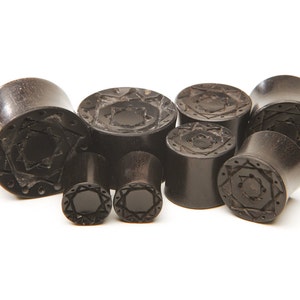 Black Plugs | Wood Plugs | Carved Plugs | Plugs and Tunnels | Ear Plugs | Carved Plugs | 2g, 0g, 00g, 7/16, 1/2, 9/16,  5/8, 11/16, 3/4, 7/8