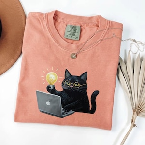 Funny Black Cat Programmer T-Shirt,Cat with Laptop and Lightbulb Tee,Coder Gift,Tech Humor Shirt,Geeky Cat Lover Gift,Comfort Colors Top