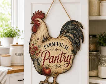 May include: A rooster-shaped wall sign with a distressed cream finish, featuring the text "FARMHOUSE Pantry" in black and red script. The design includes a red comb, a black tail, a metal pitcher with red flowers, and a red apple illustration.