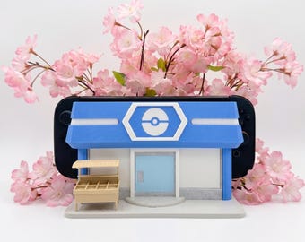 PokéMart Switch Dock – Pokopia-Stil – 3D-gedruckter blauer Shop-Konsolenständer – Passend für Switch 1/OLED & Switch 2