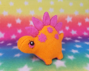 Fluffy Bottom Stacy Stegosaurus-kawaii orange and pink dinosaur 80s-inspired neon fluffy bottom plushie