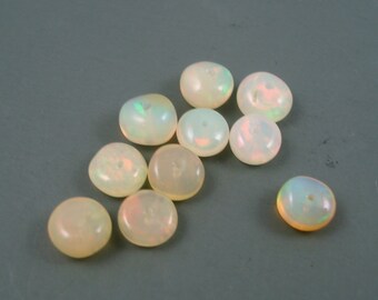 Ten Pieces Ethiopia Opal White Base Green Pink Flash  4MM to 6MM Rondells (#8)