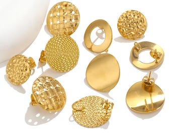 May include: A selection of gold-coloured stud earrings in diverse designs. The earrings display textured surfaces, including woven, dotted, and hammered patterns. Some are circular, while others are oval or ring-shaped, showcasing a range of styles.