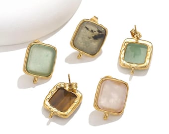 May include: Five gold-toned earrings with rectangular gemstones in various colors: light green, gray, brown, pink, and dark green. Each earring has a unique stone and a gold frame with a loop at the bottom.
