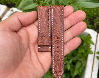 Pulseira de relógio de 20 mm em couro genuíno de avestruz marrom com fivela e sistema de liberação rápida.