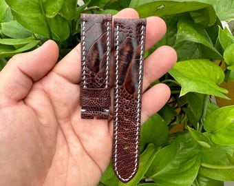 Pulseira de relógio em couro genuíno de avestruz marrom de 22 mm com fivela e pino de mola de liberação rápida.