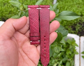 Pulseira de relógio em couro de avestruz genuíno, cor bordô, 20 mm, com fivela e sistema de liberação rápida.