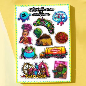 以下が含まれることがあります： 気まぐれなイラストが描かれた、カラフルなステッカーのシート。ステッカーには、笑顔の青い生き物、紫色の髪の女性、カエル、トラックなどが含まれています。ステッカーには「Cutiepatootie Stickers by All that jazz store」と書かれています。