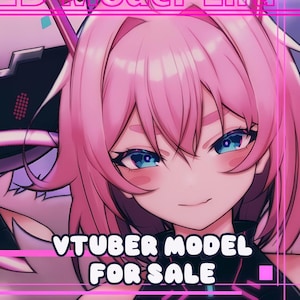 May include: A digital illustration of a female anime character with pink hair and blue eyes. The text "VTUBER MODEL FOR SALE" is displayed in white letters on a black background.