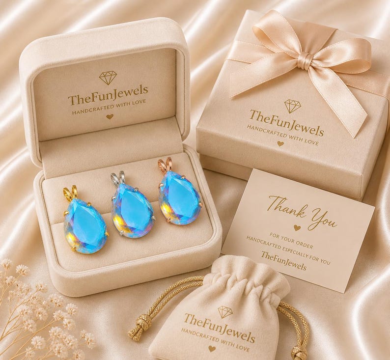 Gift ready Angel Aura Quartz teardrop pendant necklace in 925 sterling silver presented in elegant jewelry gift box, perfect for birthdays, anniversaries, holidays, and special occasions for her.