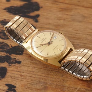 Reloj vintage Timex automático de cuerda automática, ¡no necesita pilas!
