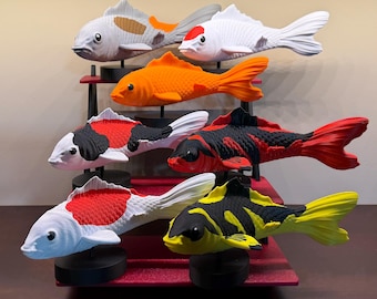 Set of 7 different Varieties of Koi fish with FREE stand included!