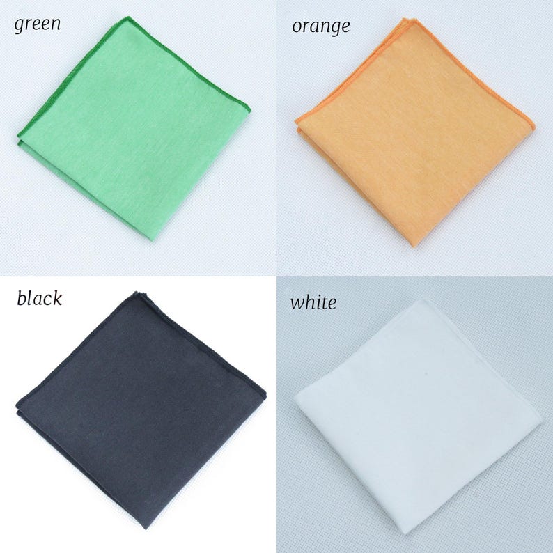 May include: Four pocket squares in various colours: green with a green border, orange, black, and white. The colours are labelled in the image. The pocket squares are square and appear to be made of fabric.