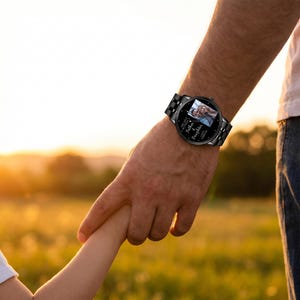 May include: Black wristwatch with a photo of a couple on the watch face. The watch has a black metal band and the words "The Love Between a Father & Daughter Lasts Forever" are printed on the watch face.