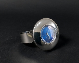 Reloj ETIENNE Space Age UFO con esfera azul, 17 joyas, fabricado en Suiza en los años 70.