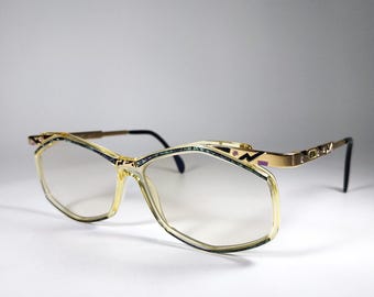 Gafas CAZAL © Mod. 354. Montura chapada en oro, años 90. Fabricadas en Italia.