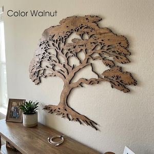 May include: A large, flat, walnut-coloured wooden wall art piece shaped like a sprawling tree with intricate branches and exposed roots. The text 'Color Walnut' is printed in the upper left corner of the image above the tree silhouette.