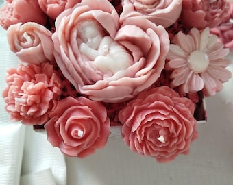 Handmade wax candles, in wax flower bouquets