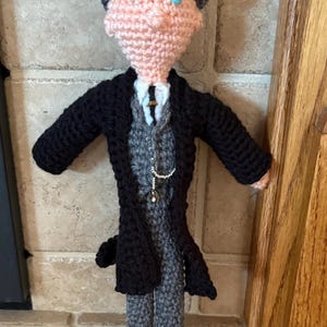 Thomas Shelby inspired amigurumi crochet figure.