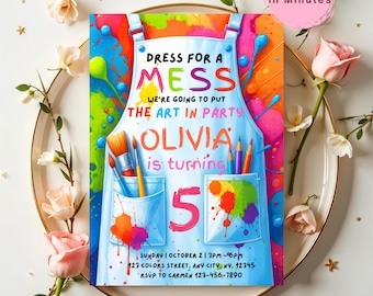 May include: A colorful invitation for an art-themed birthday party. The design features a light blue apron with paint splatters and pockets holding brushes and pencils. Text includes "Dress for a Mess" and the name "Olivia" turning 5.