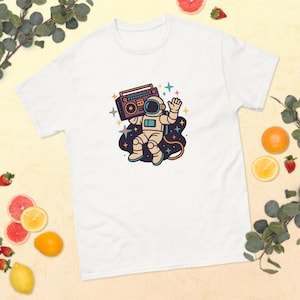 Retro Astronaut T-Shirt, Vintage Space Graphic Tee, Cosmic Boombox Shirt, Funky 80s Music Gift, Astronaut Graphic Tee