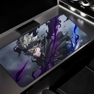 May include: Rectangular mousepad featuring a dynamic anime character with spiky white hair and a determined expression. The design incorporates shades of purple and black, creating a dramatic effect. The mousepad is placed on a dark desk.