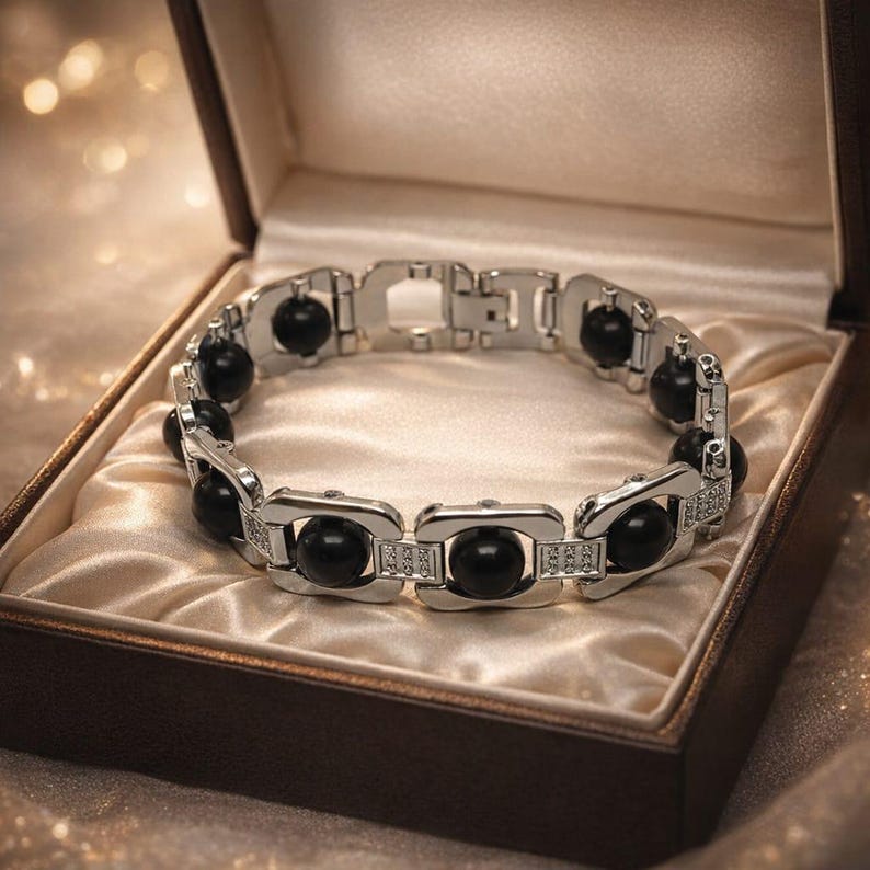 Certified Karungali bracelet with black beads and silver links