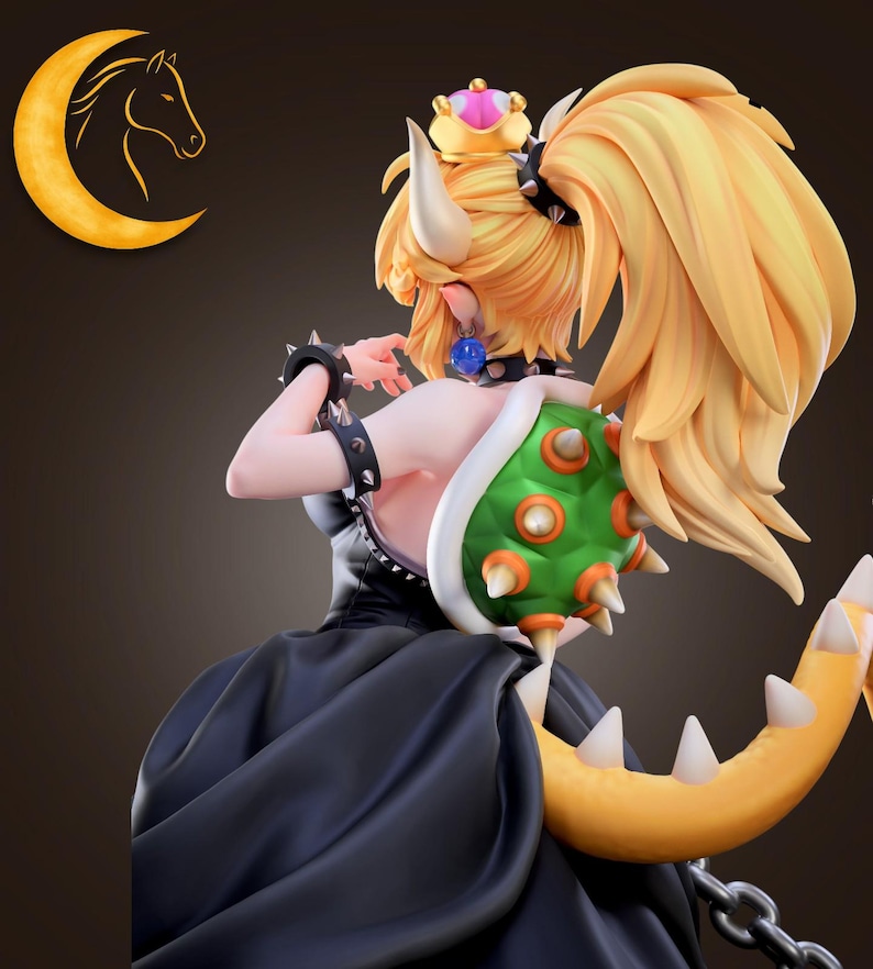 May include: A figurine of a character with blonde hair, a crown, and a black dress. The character has a green shell on their back and a yellow tail. The figurine is detailed and appears to be from a video game.
