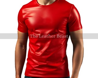May include: A vibrant red t-shirt with short sleeves. The shirt has a glossy, leather-like appearance. The text "The Leather Beast" is printed on the front. The model is wearing blue jeans.
