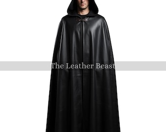 May include: A black hooded cloak with a leather-like appearance. The cloak has a long, flowing design and a clasp closure at the neck. The text "The Leather Beast" is visible at the bottom of the cloak.