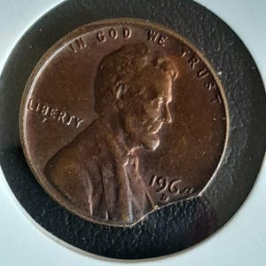 Error USA 1964 One cent Clipped Planchet