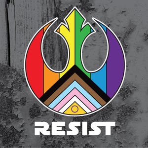 May include: A colorful graphic featuring a rainbow-colored symbol with a white outline, incorporating a peace sign and a stylized emblem. The word "RESIST" is printed in white block letters below the symbol. The background is a textured gray.