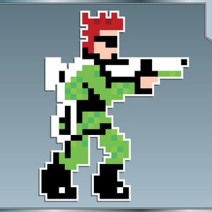 May include: Pixelated illustration of a soldier in green and black camouflage, holding a white rifle. The character has red hair and is wearing black sunglasses. The background is a gradient of blue and gray.